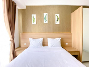 Best Homey 1BR at 25th Floor Vasanta Innopark Apartment By Travelio